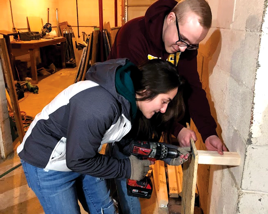 Blouin Scholar students working on a construction project