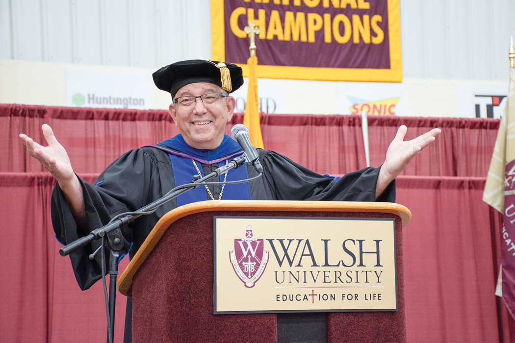Dr. Michael Dunphy speaks at the podium during Walsh University 2026 Commencement