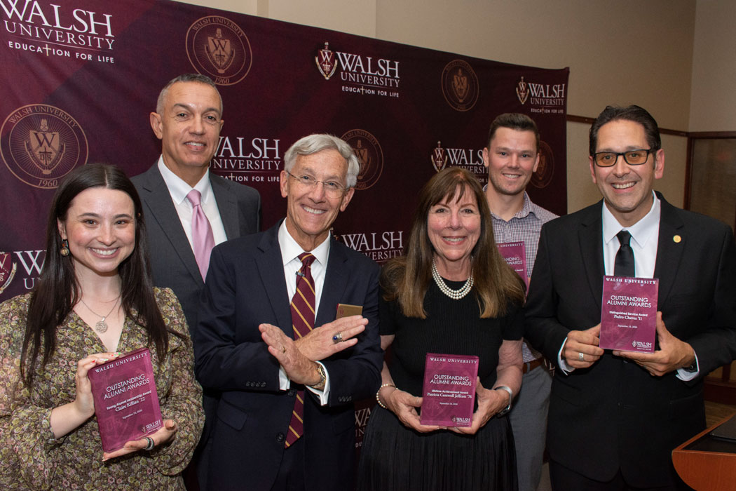 Photo of Outstanding Alumni Awards Winners and President Tim Collins